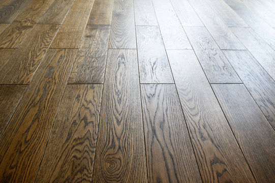 Seamless oak parquet pattern , natural flooring of rich brown color