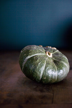 Green squash on table