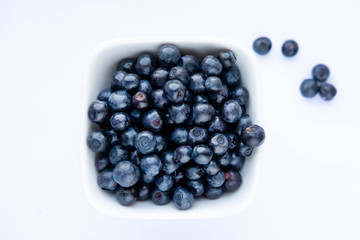 Blueberry berries isolated on white background. Photos of blueberries for designers. Closeup of a blueberry.