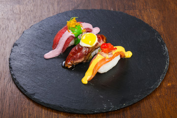 Sushi with tuna, salmon and beef