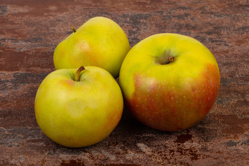 Ripe apples over background