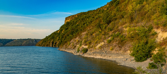 Obraz premium Eastern European hill land with lake peaceful scenery landscape natural environment of national park in Ukraine in September early autumn season weather and colors time 
