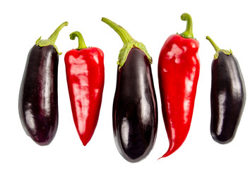 vegetables red peppers and eggplant on a white background