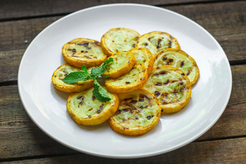 zucchini yellow fried grill (delicious vegetable dish) menu. top food background. copy space
