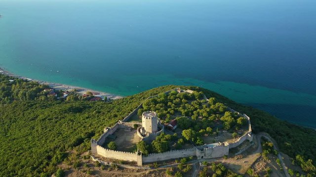 Aerial drone view video of iconic and historic medieval castle of Platamonas built in the slopes of Mount Olympus in Pieria area, North Greece