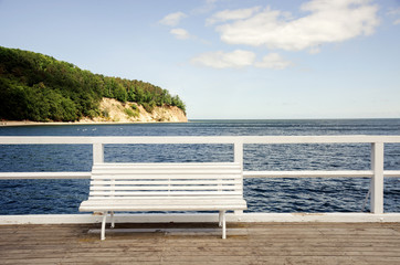wooden bench on pier