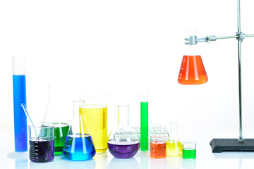 Laboratory glassware with colorful chemical reagent in research laboratory 