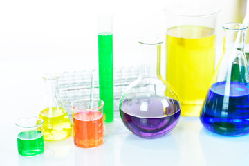 Laboratory glassware with colorful chemical reagent in research laboratory 