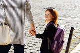 Amazing red haired girl listening to her mom
