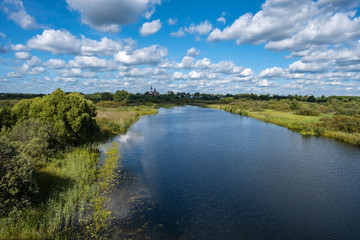 Summer rural landscape with the Lukh River in the village of Myt, Russia.