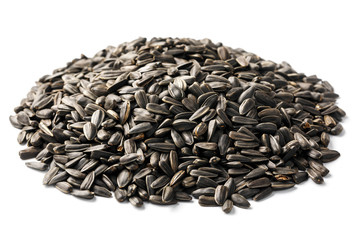 Seeds in a black shell are a bunch on a white background. In full screen