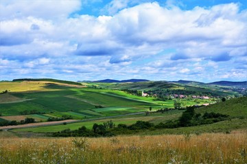 Fototapeta na wymiar A beautiful rural landscape in Transylvania. Village of Hodosa Mures county - Romania 