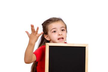 Little girl holding chalkboard.