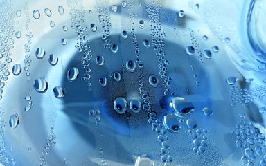 Naklejka na ściany i meble Beautiful Blue Dew Drops In Glass