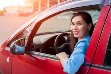 Young woman driving her car