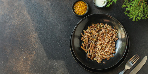 buckwheat with mushrooms (buckwheat porridge, no meat) vegetarian menu. top food background. copy space