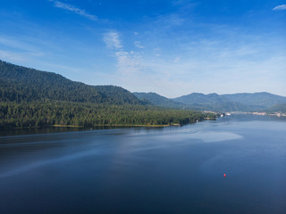 Aerial view on Teletskoye lake in Altai mountains, Siberia, Russia. Drone shot. Beauty summer day.
