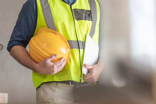 Architect With Hardhat And Safety Vest