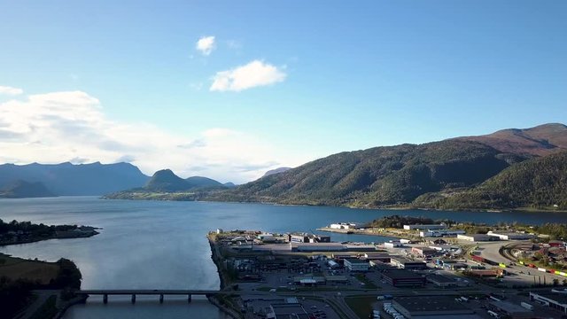 Aerial beautiful landscape of Norwegian coastal city at Romsdalsfjorden. PAN RIGHT TO LEFT