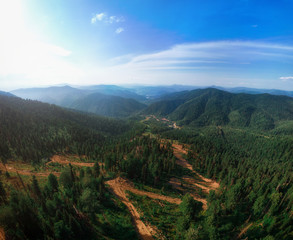 Fototapeta na wymiar Beauty day in the mountains in Altay, panoramic picture. Aerial shot on drone