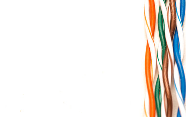 Multi colored twisted network cable isolated on white background