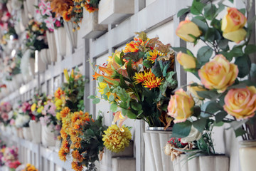 flowers on the crypt of the cemetery