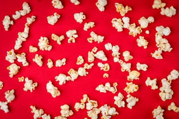 Popcorn on red background.