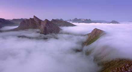 Panoramic view of misty mountains in Norway, Senja