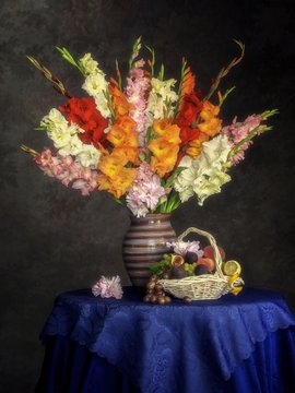 Still life with splendid bouquet of  gladiolus flowers