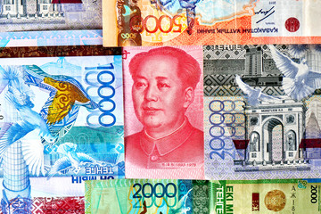 Chinese money Yuan and Kazakh tenge. Currency exchange concept, rise and fall in the business market