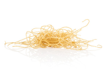 Lot of pieces of thin raw pasta noodles stack isolated on white background