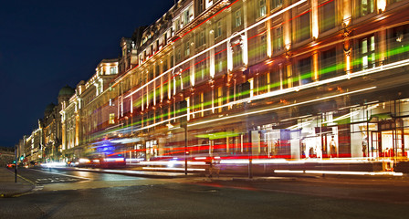Fototapeta na wymiar night scene of London city United Kingdom - moving cars - long exposure