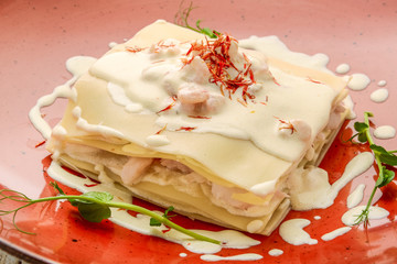 seafood lasagna with salmon and white sauce