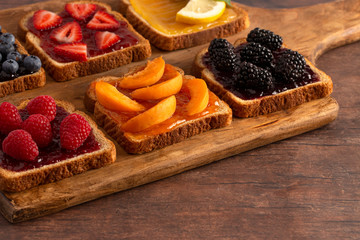 Six Pieces of Fruit Toast on a Cutting Board