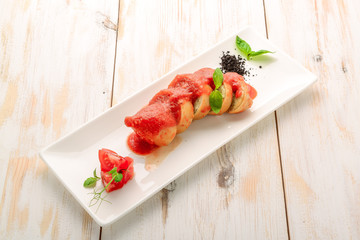 Delicious homemade stuffed squid with prawns, eggs