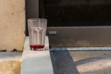 Dirty empty drinking glass, empty drinking glass