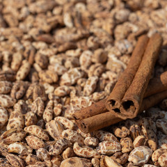 Solid background of foamed rice with cinnamon flavor and color