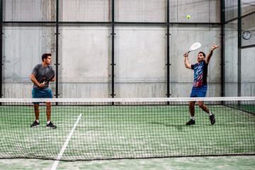 Men playing padel
