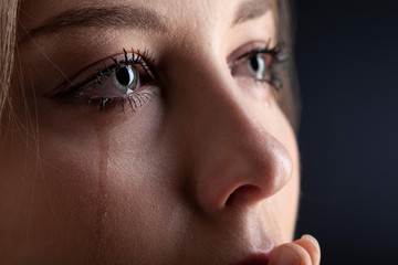 tears on woman face, beauty girl cry on black background - 286181962