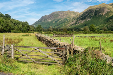 Fototapeta na wymiar Hiking between Brotherswater to Angle Tarn in Patterdale part of the English Lake District surrounded by many Wainwrights 