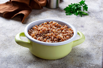 Buckwheat porridge in green pot