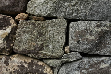 old stone wall of stones