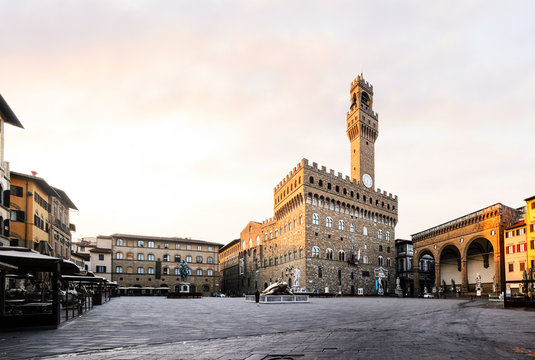 FLORENCE, ITALY - JUNE 23, 2016: Panoramic view of Signoria square with Searching for Utopia monument of the golden turtle by Jan Fabre. Empty morning view without tourists. Piazza della Signoria
