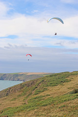 paragliders flying at Newgale, Wales