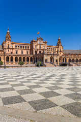 Fototapeta na wymiar Checkerboard pattern on the Plaza Espana in Sevilla, Spain