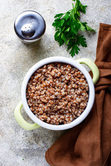 Buckwheat porridge in green pot
