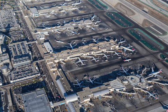 Aerial view of busy LAX terminals and jet airplanes on August 16, 2016 in Los Angeles, California, USA.