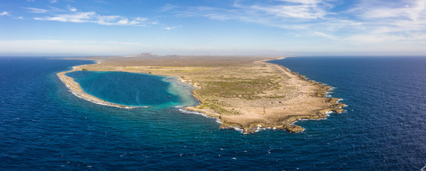 Aerial view of coast of Curaçao in the Caribbean Sea with turquoise water, cliff, beach and...