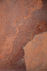 Old rich rusty metal texture background. Vertical image.