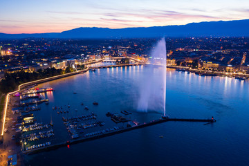 Aerial  night view of Geneva city water fountain in Switzerland